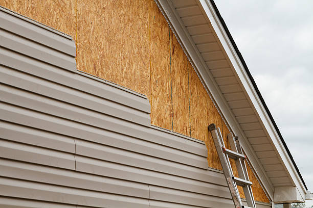 Professional Emergency Siding Repair technician working in Andover, MA